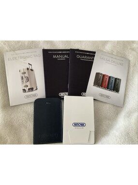 Authentic Rimowa Luggage Tag, Salsa Deluxe Manuals Certificate Books
